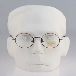 Fidela 752 114, Vintage 90s antique bronze flexible wire round eyeglasses frames mens & womens NOS