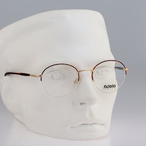 Fidela Atlantic, Vintage 90s gold and tortoise half rim panto round eyeglasses frames mens & womens NOS