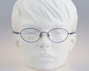 Shiseido 1056 2 Titanium, Vintage 90s blue oval eyeglasses frames women / NOS