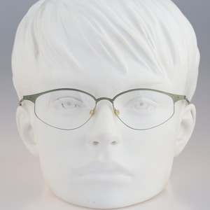 It&#39;s Titanium 606 53, Vintage 90s laser cut ultra lightweight nylor green small cat eye glasses frames women / NOS