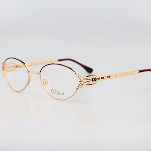 Diva 5045 3E, Vintage 90s gold and tortoise browline victorian oval eyeglasses frames womens NOS