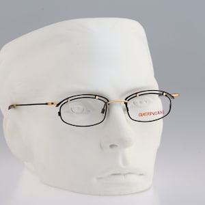 Contro Verse 3900 148 78, Vintage 90s black and gold steampunk small rectangle eyeglasses frames mens & womens NOS