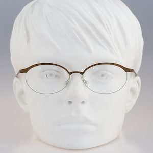 It&#39;s Titanium 603, Vintage 90s laser cut ultra lightweight nylor yellow oval eyeglasses frames women / NOS
