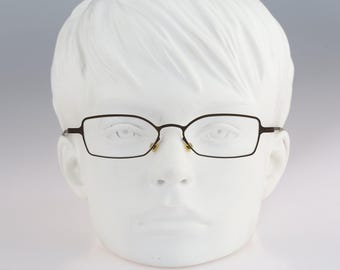It's Total no. 9, Vintage 90s laser cut ultra lightweight nylor small cat eye glasses frames women / NOS