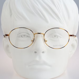 Rolling 611, Vintage 90s tortoise and gold small round eyeglasses frames mens & womens NOS