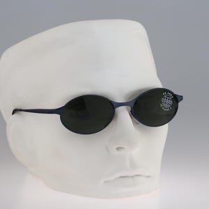 Vuarnet Pouilloux 055 0700, Vintage 90s blue tempered glass lenses unique wrap oval sunglasses mens & women NOS