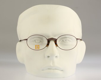 Titan by Metzler Eyeglasses Frames Sivler Gold Oval Full Rim  display picture 1