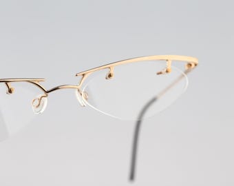 Time Out 2 01, Vintage 90s unique gold browline half rim slim oval glasses frames womens / NOS
