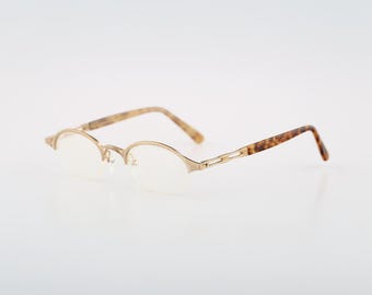Japonish JN 615 1, Vintage 90s unique gold half rim small oval glasses frames womens NOS