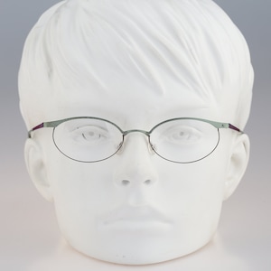 It&#39;s Titanium 604, Vintage 90s laser cut ultra lightweight nylor green oval cat eye glasses frames women / NOS