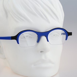Iyoko Inyake Belgian Design IY 721 78, Vintage 2000s blue and black unique half rim small round eyeglasses frames mens & womens NOS