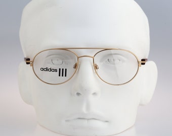 Adidas A910, Vintage 90s gold small round aviator glasses frames mens & womens NOS