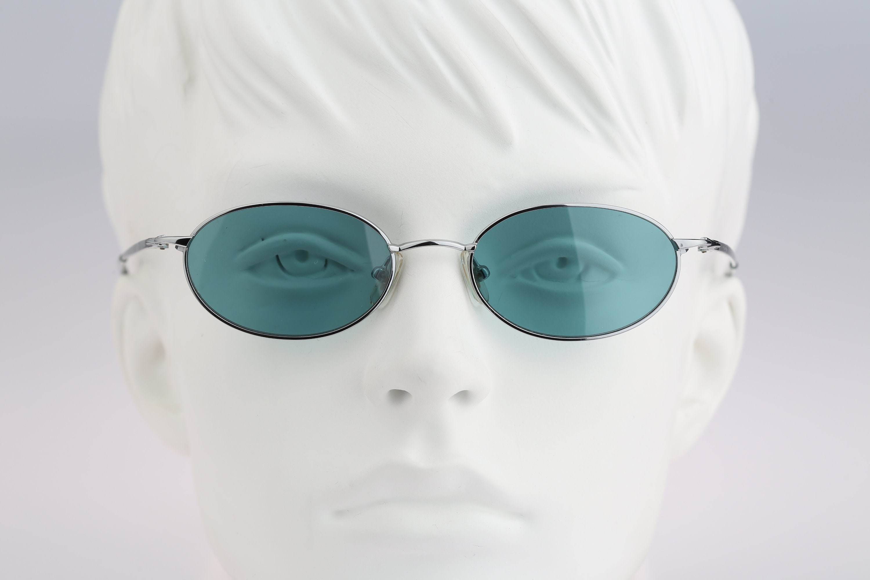 Shiseido 1022 Titanium, Vintage 90s tinted lenses unique slim silver oval sunglasses women NOS
