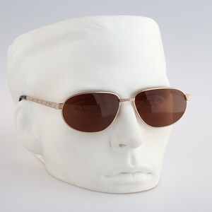 Poker 2057 1, Vintage 90s gold oval sunglasses men and women NOS