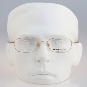 Nikon Dura Titan DT4366 0001, Vintage 90s unique gold small rectangle eyeglasses frames mens & women NOS