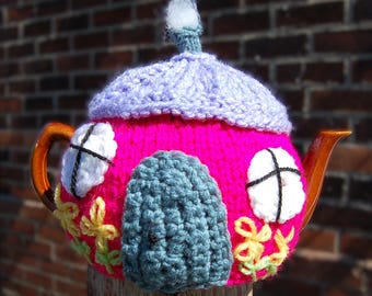 Hand Knitted small Cottage Tea Cosy: lilac and deep pink