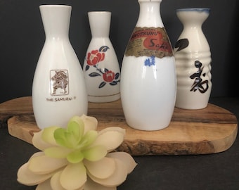 Four Vintage Japanese Porcelain Sake Bottles