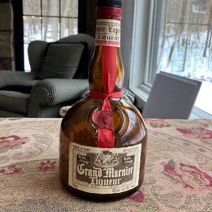 Collectible empty 750 ml Grand Marnier Liqueur bottle manufactured by Ste Marnier-Lapostolle, Paris France, barware, mancave decor, cork top