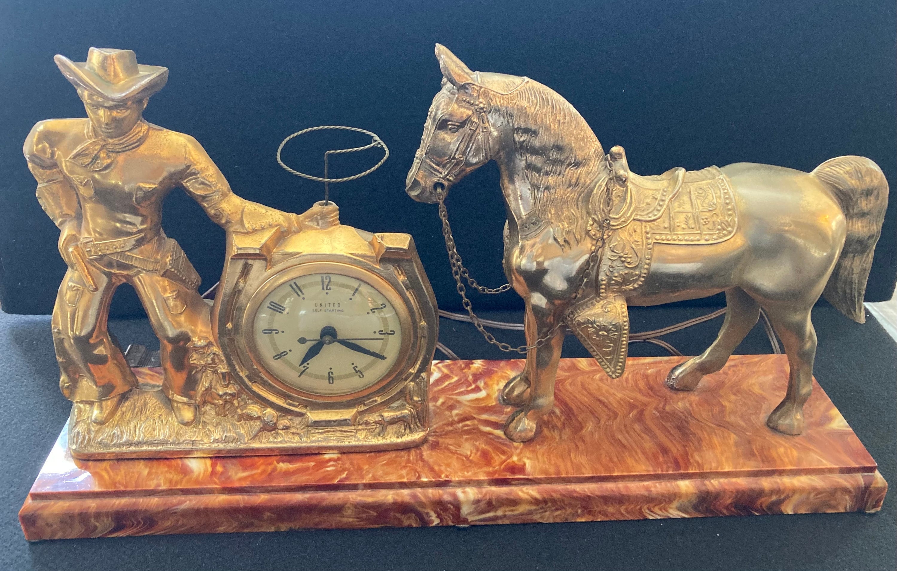 Rare Vintage 1950's United Mantle Electric Clock, Gold Tone Metal Western Cowboy with Moving Lasso and Saddled Horse on Marbled Plastic Base