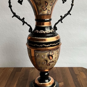 Beautiful Turkish vase made of copper, decorated with intricate floral engravings and featuring two handles, 13" tall