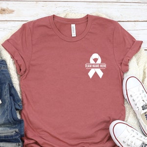 Custom Name Team Cancer Tee, Cancer Support Team Pocket Tee, Motivational Shirt, Minimal Pink Ribbon Cancer Shirt, Pocket Personalized Shirt