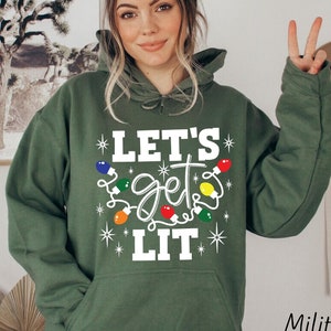 Lets get lit sweater hotsell