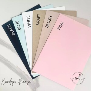 May include: A variety of envelope colors, including black, blue, white, kraft, blush, and pink. The envelopes are arranged in a fan shape, with the text "Envelope Range" visible at the bottom of the image.