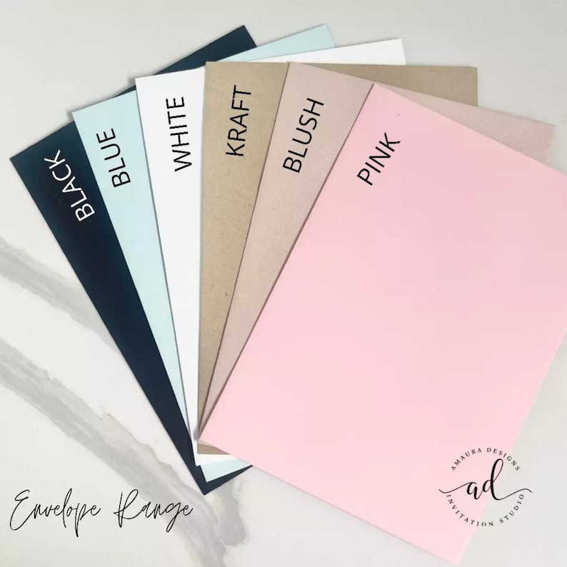 May include: A variety of envelope colors, including black, blue, white, kraft, blush, and pink. The envelopes are arranged in a fan shape, with the text "Envelope Range" visible at the bottom of the image.