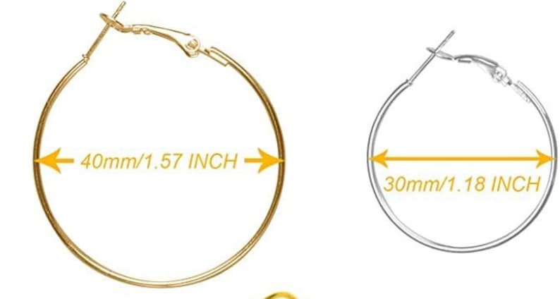 May include: Two pairs of hoop earrings, one gold and one silver. The gold earrings are 1.57 inches in diameter, and the silver earrings are 1.18 inches in diameter.