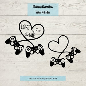 May include: Black and white digital illustration of two video game controllers connected by a cord forming a heart shape. The text "Love is in the game" is written inside the heart.