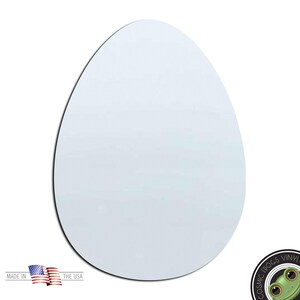 May include: A white egg-shaped mirror with a smooth, reflective surface. The mirror is made of acrylic and is perfect for adding a modern touch to any room.