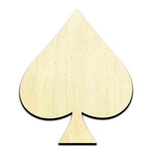May include: A wooden cutout of a spade playing card symbol. The cutout is made of light brown wood with a natural grain pattern.