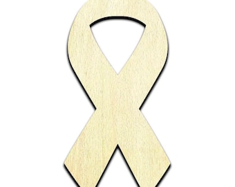 May include: A light-colored wooden awareness ribbon cutout with a smooth, natural grain finish. The shape features a classic looped top and two crossed tails at the bottom, with clean, dark-edged borders defining the silhouette against a white background.