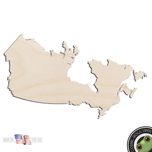 May include: A wooden cutout of the outline of Canada. The cutout is a light brown color and is made of wood. The cutout is a popular craft supply for home decor and DIY projects.