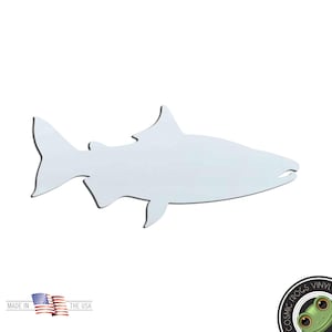 May include: A white shark-shaped vinyl decal with a black outline. The decal is a silhouette of a shark, featuring a dorsal fin, pectoral fins, and a tail fin. The text "MADE IN THE USA" is visible in the lower left corner.