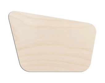 May include: A flat, light-coloured wooden cutout with a smooth surface and visible natural wood grain. The shape is an irregular trapezoid featuring rounded corners on the right side and a wider, angled top edge, presenting a clean, unfinished look.