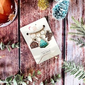 Drie geëmailleerde kerststeekmarkeerders Keuze uit verschillende items voor al je brei- en haakwensen! Optionele GRATIS opbergtas