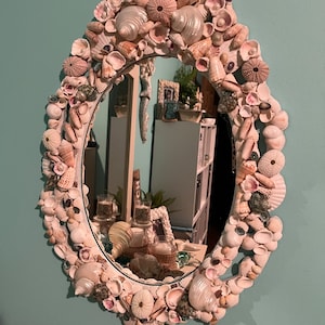 Seashell cutaway oval mirror