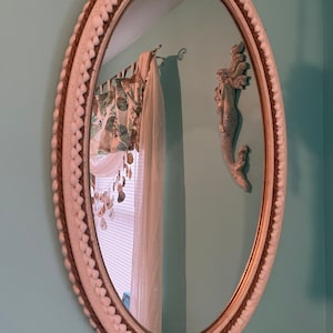 Oval Nautical Themed mirror with seashells and rope