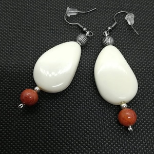 Hanging earrings with white pendant and red pearl - handmade