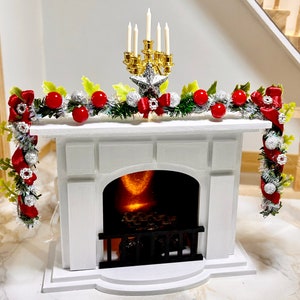Dollhouse miniature wooden fireplace with fire, fireplace insert with light, glowing Christmas garland. Christmas decoration for dolls 1/12.