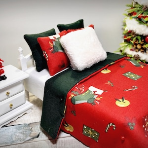 Miniature Christmas dollhouse bed linen set. Pillows, blanket,  sheets with Christmas motif Christmas sock and gift. Bedding for 1/12 dolls.