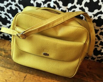 Un voyage bag yellow hotsell