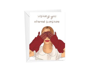 Puede incluir: Una tarjeta de felicitación con una mujer con guantes rojos cubriéndose los ojos. El texto de la tarjeta dice "Te deseo eterna luz del sol."