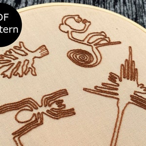 May include: Embroidered hoop art with brown thread depicting a monkey, a tree, a spider, and a bird. The hoop is on a beige fabric background. The text "PDF pattern" is in a black circle in the top left corner.
