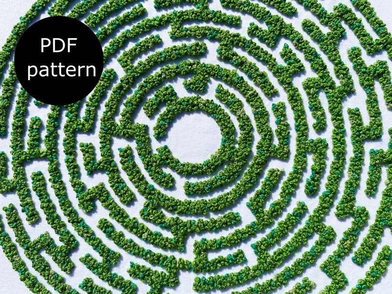 May include: A green and blue circular maze pattern, created with embroidery, on a white background. The text "PDF pattern" is in a black circle at the top left of the image.