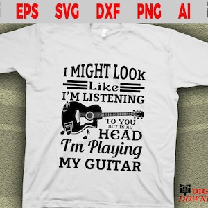 May include: White t-shirt with a black graphic design of a guitar and the text "I might look like I'm listening to you but in my head I'm playing my guitar."