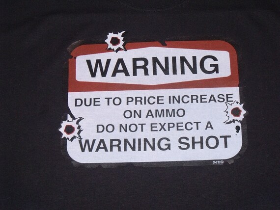 'Due To Price Increase Of Ammo, Do Not Expect A Warning Shot' Tin Sign - NRA
