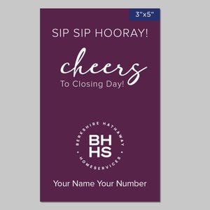 May include: A purple card with the text "SIP SIP HOORAY! cheers To Closing Day!" and a white circle logo with the text "BERKSHIRE HATHAWAY BHHS HOMESERVICES" in white. The card also has the text "Your Name Your Number" in white.