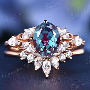 Alexandrite wedding ring set oval alexandrite engagement ring unique alexandrite cluster ring art deco bridal ring set moissanite ring band